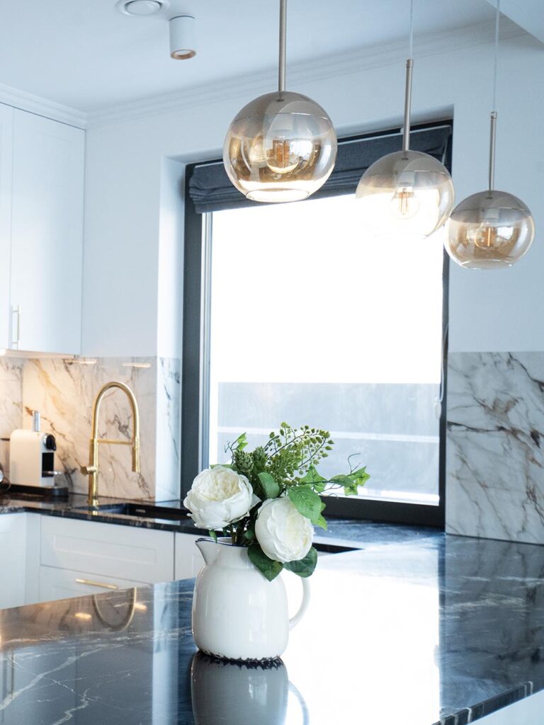 Modern open-concept kitchen renovation completed by professional remodeling contractors service areas