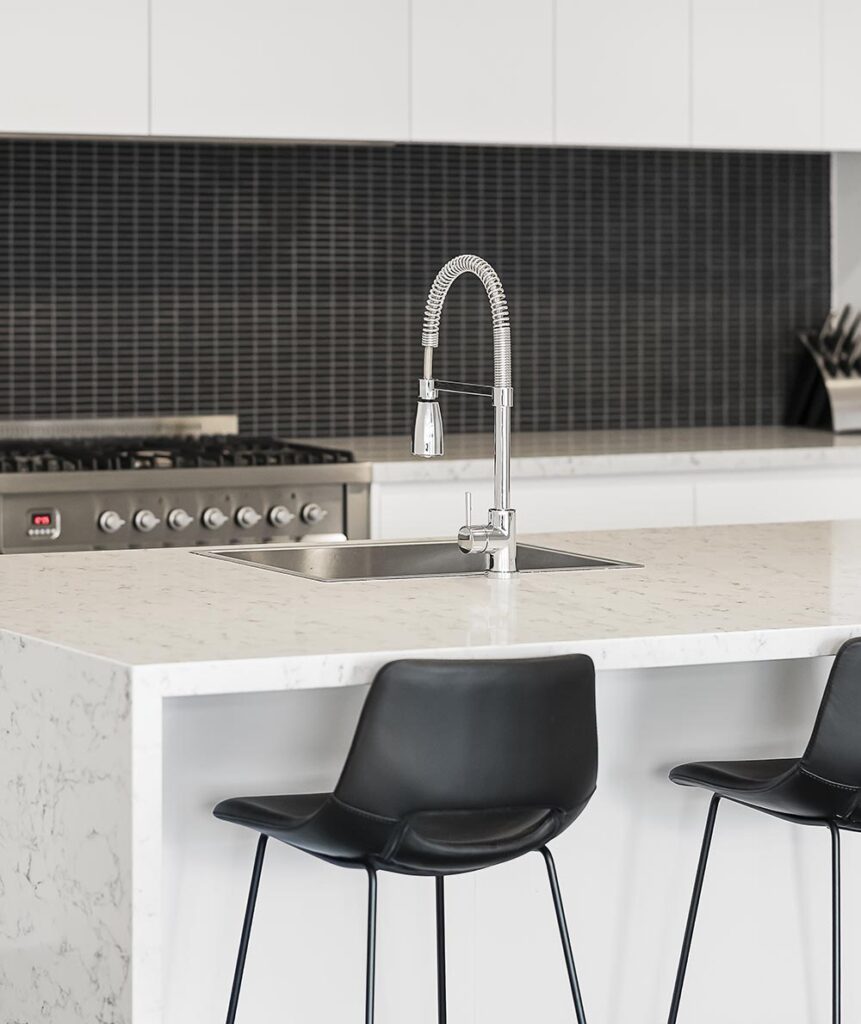 Modern open-concept kitchen renovation completed by professional remodeling contractors Tecumseh, MI