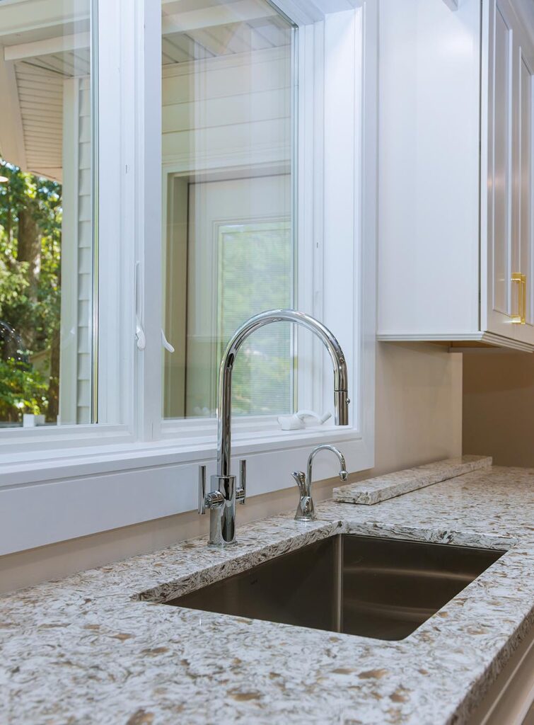 Modern open-concept kitchen renovation completed by professional remodeling contractors Toledo OH.