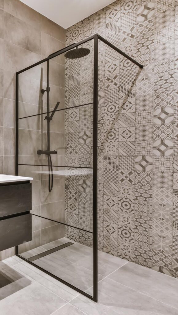 Modern residential bathroom transformation featuring high-quality refinishing services in Van Buren, MI by Backwoods Refinishing.