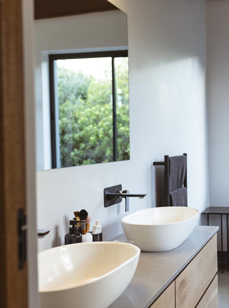 Modern residential bathroom transformation featuring high-quality refinishing services in Westland, MI by Backwoods Refinishing.